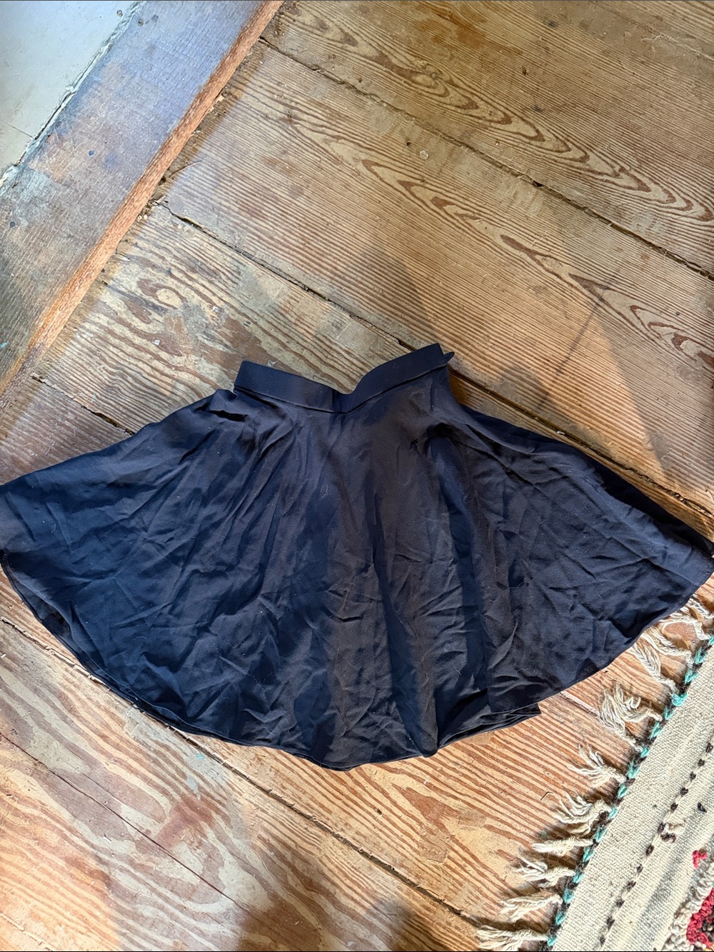 Vintage Donna Karan Black skater 100% wool Skirt made in USA, small hole